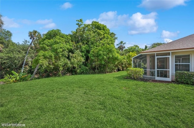 20902 Blacksmith Frg, Estero, FL 33928 - view of green lawn featuring a sunroom
