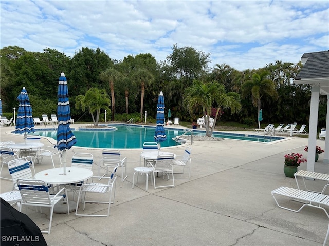 pool with a patio
