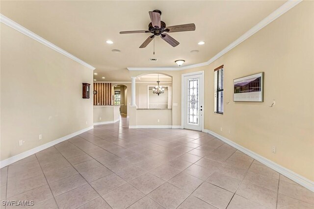 9190 Water Tupelo Rd, Fort Myers, FL 33912 - unfurnished living room with light tile patterned flooring, arched walkways, ceiling fan with notable chandelier, recessed lighting, and ornamental molding