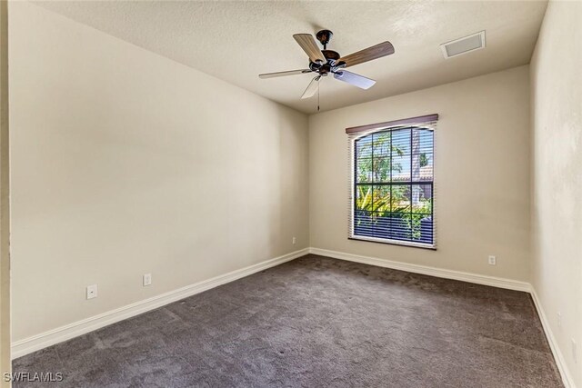 9190 Water Tupelo Rd, Fort Myers, FL 33912 - spare room with visible vents, baseboards, dark colored carpet, ceiling fan, and a textured ceiling