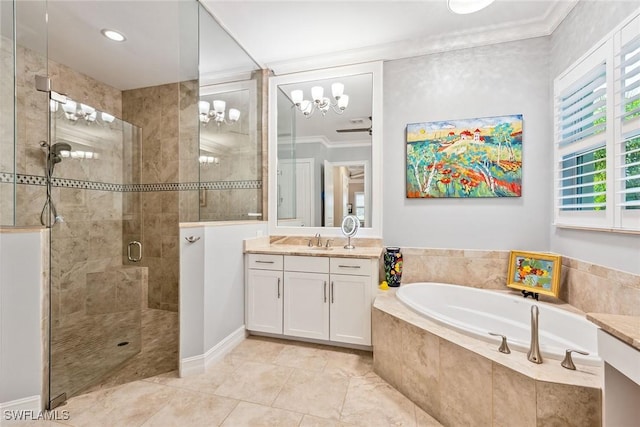 bathroom with vanity, ornamental molding, a stall shower, a chandelier, and a bath
