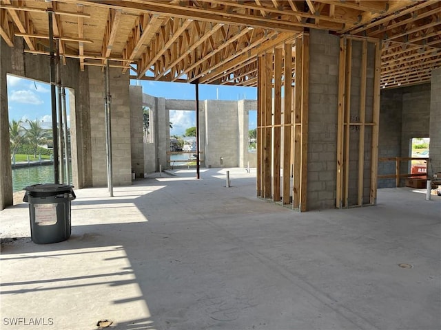 983 Sundrop Ct, Marco Island, FL 34104 - misc room with healthy amount of natural light and a water view