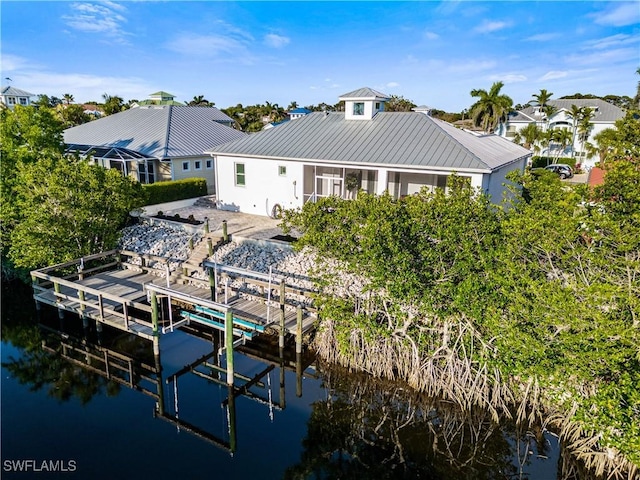 27080 Flamingo Dr, Bonita Springs, FL 34135 - view of dock featuring a water view