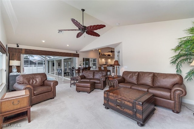 5131 SW 19th Ave, Cape Coral, FL 33914 - living area with high vaulted ceiling, visible vents, light colored carpet, and a ceiling fan