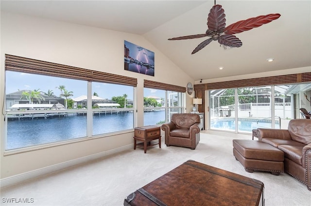 5131 SW 19th Ave, Cape Coral, FL 33914 - living room with ceiling fan, light colored carpet, recessed lighting, a water view, and baseboards