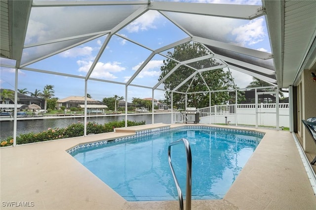 5131 SW 19th Ave, Cape Coral, FL 33914 - pool featuring a patio area, fence, glass enclosure, and a water view