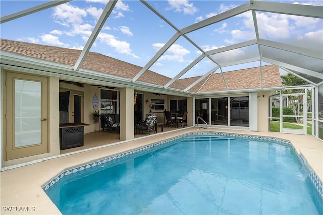 5131 SW 19th Ave, Cape Coral, FL 33914 - pool featuring a patio area, a ceiling fan, and glass enclosure