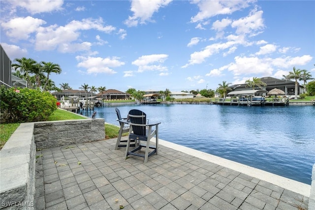 5131 SW 19th Ave, Cape Coral, FL 33914 - exterior space with a water view, a boat dock, glass enclosure, and a residential view