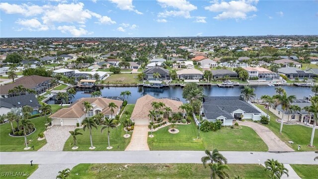 5131 SW 19th Ave, Cape Coral, FL 33914 - bird's eye view featuring a water view and a residential view