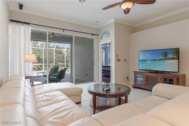 8815 Naples Heritage Dr Unit D9, Naples, FL 34112 - living room featuring crown molding, light tile patterned floors, a ceiling fan, and visible vents
