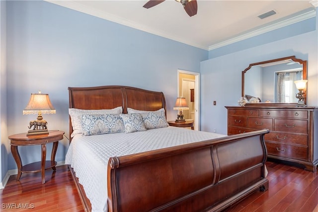 8815 Naples Heritage Dr Unit D9, Naples, FL 34112 - bedroom featuring visible vents, baseboards, ornamental molding, and dark wood finished floors