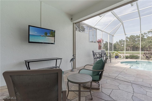 8815 Naples Heritage Dr Unit D9, Naples, FL 34112 - view of patio / terrace with an outdoor pool and glass enclosure