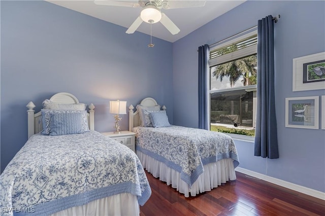 8815 Naples Heritage Dr Unit D9, Naples, FL 34112 - bedroom featuring baseboards, a ceiling fan, and wood finished floors