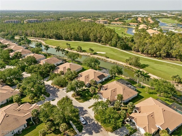 8815 Naples Heritage Dr Unit D9, Naples, FL 34112 - drone / aerial view featuring golf course view, a residential view, and a water view