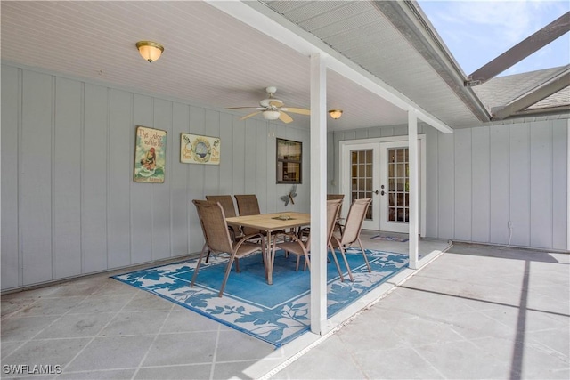 view of patio with french doors, ceiling fan, and outdoor dining area