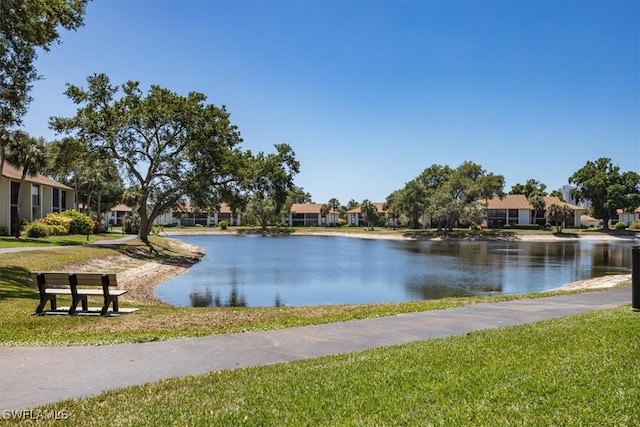 576 Retreat Dr Unit 101, Naples, FL 34110 - property view of water featuring a residential view