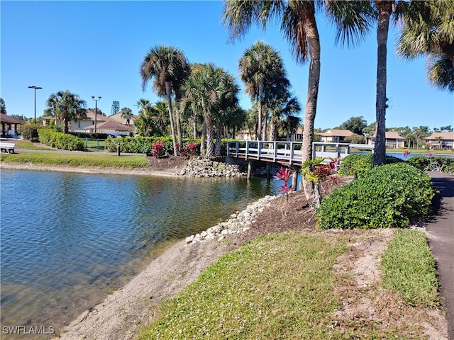 576 Retreat Dr Unit 101, Naples, FL 34110 - dock area with a water view
