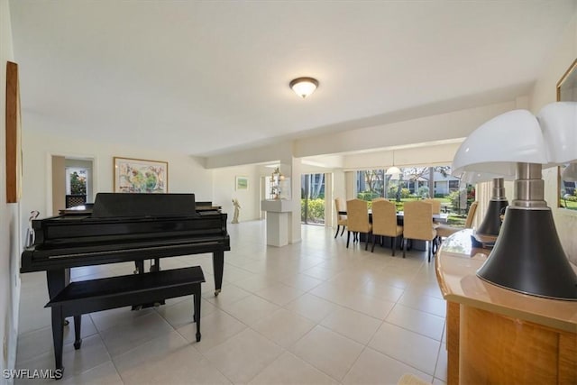 576 Retreat Dr Unit 101, Naples, FL 34110 - living area featuring light tile patterned flooring