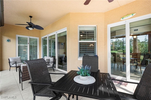 10637 Pelican Preserve Blvd Unit A, Fort Myers, FL 33913 - view of patio / terrace with visible vents, a ceiling fan, and outdoor dining space