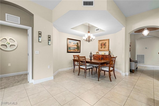 10637 Pelican Preserve Blvd Unit A, Fort Myers, FL 33913 - dining space featuring light tile patterned floors, arched walkways, and visible vents