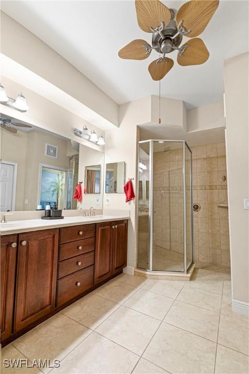 10637 Pelican Preserve Blvd Unit A, Fort Myers, FL 33913 - full bath with tile patterned flooring, a ceiling fan, and a stall shower
