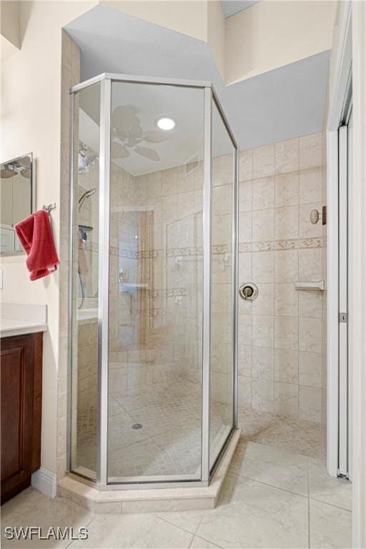 10637 Pelican Preserve Blvd Unit A, Fort Myers, FL 33913 - bathroom with a stall shower, tile patterned floors, and vanity