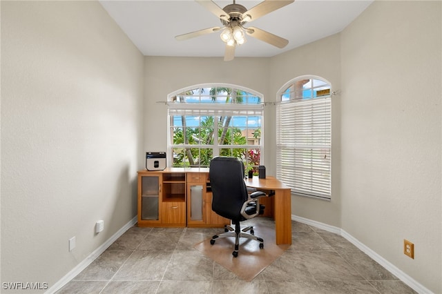 3428 SW 27th Pl, Cape Coral, FL 33914 - office area with baseboards, a ceiling fan, and plenty of natural light