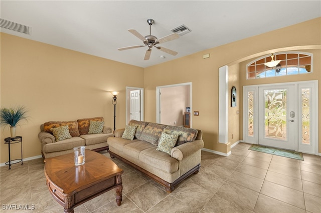 3428 SW 27th Pl, Cape Coral, FL 33914 - living area with light tile patterned floors, visible vents, baseboards, and ceiling fan