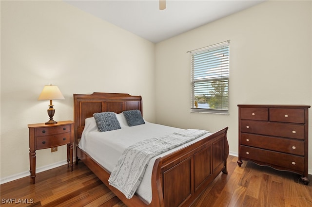 3428 SW 27th Pl, Cape Coral, FL 33914 - bedroom featuring dark wood-style flooring, baseboards, and a ceiling fan