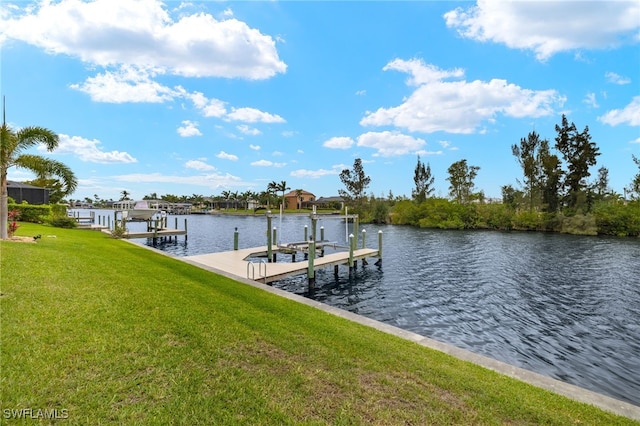 3428 SW 27th Pl, Cape Coral, FL 33914 - view of dock with boat lift, a water view, and a lawn