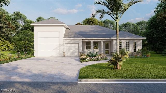 25197 Delgado Dr, Punta Gorda, FL 33955 - view of front of property featuring a garage, a front lawn, driveway, and stucco siding