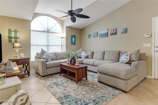 13199 Whitehaven Ln Unit 1808, Fort Myers, FL 33966 - living area featuring light tile patterned floors, a ceiling fan, lofted ceiling, and baseboards