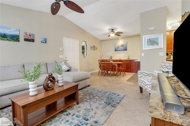 13199 Whitehaven Ln Unit 1808, Fort Myers, FL 33966 - living area with baseboards, light tile patterned floors, a ceiling fan, and vaulted ceiling