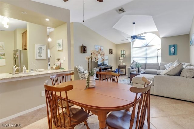 13199 Whitehaven Ln Unit 1808, Fort Myers, FL 33966 - dining area with lofted ceiling, light tile patterned floors, visible vents, and a ceiling fan