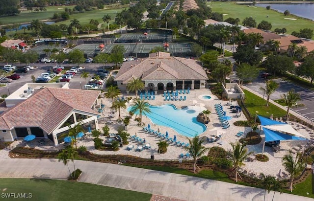 bird's eye view with golf course view and a water view