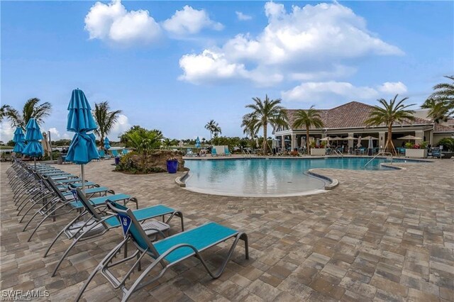 pool with a patio