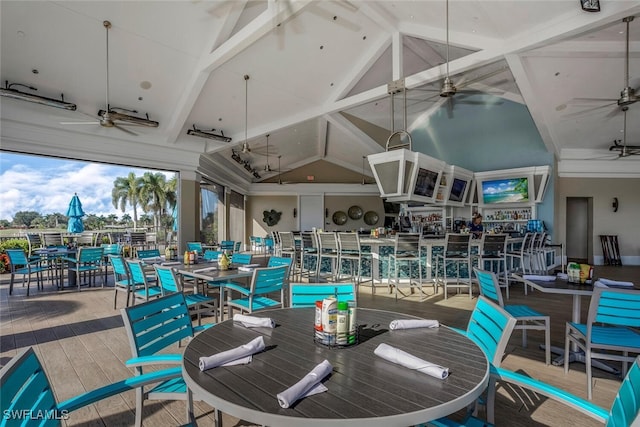 view of patio / terrace featuring outdoor dining area and a ceiling fan