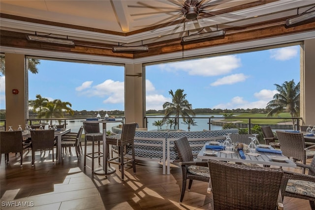 sunroom with a water view