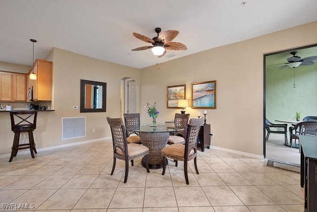 8945 Malibu St Unit 204, Naples, FL 34113 - dining space with ceiling fan, light tile patterned flooring, and visible vents