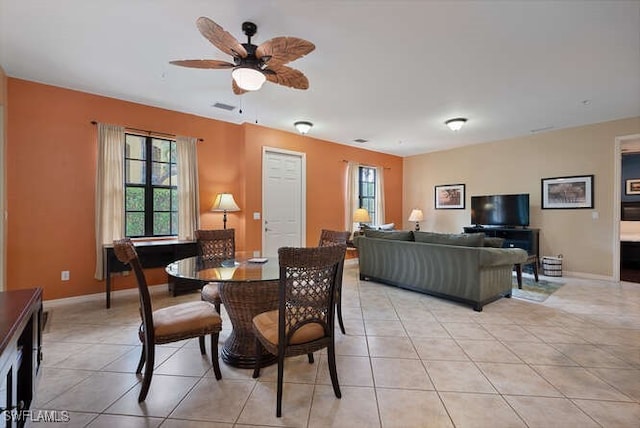 8945 Malibu St Unit 204, Naples, FL 34113 - dining space featuring plenty of natural light, ceiling fan, light tile patterned flooring, and visible vents