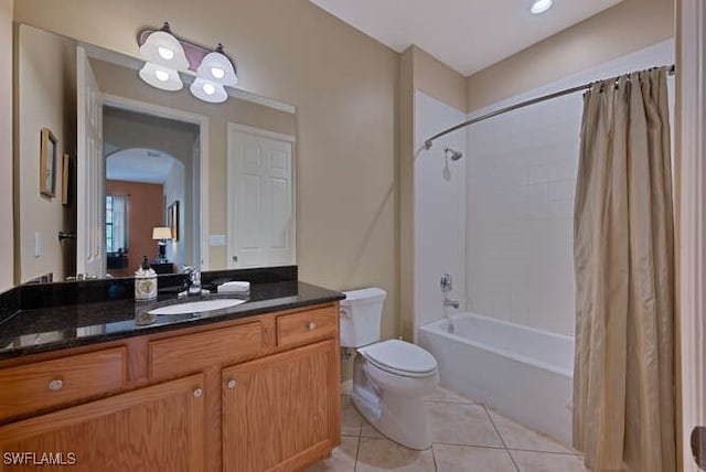 8945 Malibu St Unit 204, Naples, FL 34113 - full bathroom with vanity, tile patterned flooring, toilet, and shower / tub combo with curtain