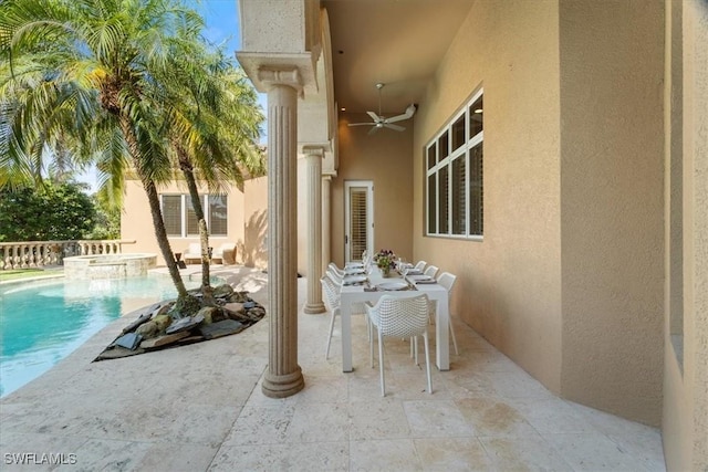 550 21st Ave S, Naples, FL 34102 - view of patio with ceiling fan and a pool with connected hot tub