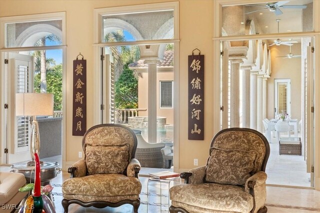 550 21st Ave S, Naples, FL 34102 - sitting room with a ceiling fan and a towering ceiling