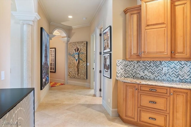 550 21st Ave S, Naples, FL 34102 - hallway with light tile patterned floors, decorative columns, baseboards, ornamental molding, and recessed lighting
