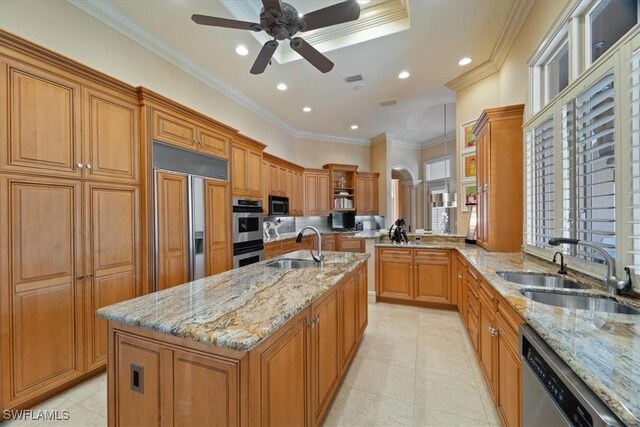 550 21st Ave S, Naples, FL 34102 - kitchen with a sink, stainless steel appliances, open shelves, and a ceiling fan