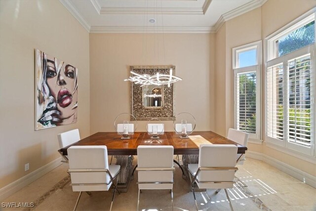 550 21st Ave S, Naples, FL 34102 - dining room with a tray ceiling, ornamental molding, baseboards, and a notable chandelier