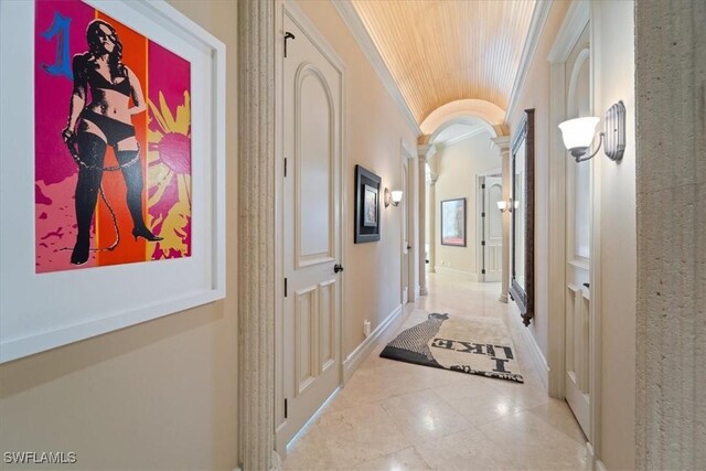 550 21st Ave S, Naples, FL 34102 - hall with wood ceiling, decorative columns, tile patterned floors, vaulted ceiling, and ornamental molding