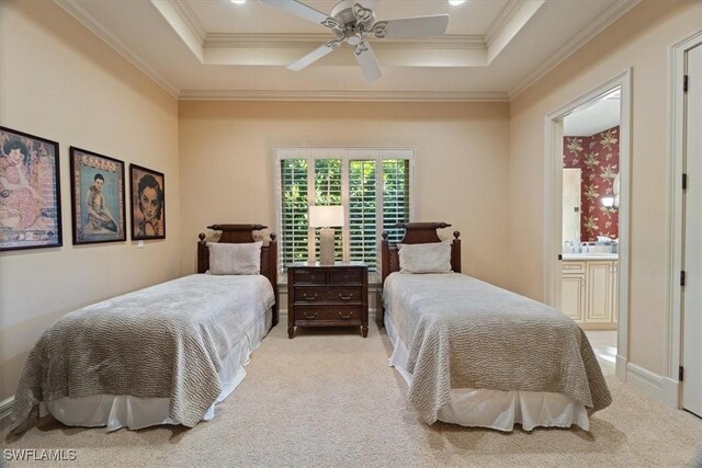 550 21st Ave S, Naples, FL 34102 - bedroom featuring a tray ceiling, crown molding, carpet flooring, and ensuite bath