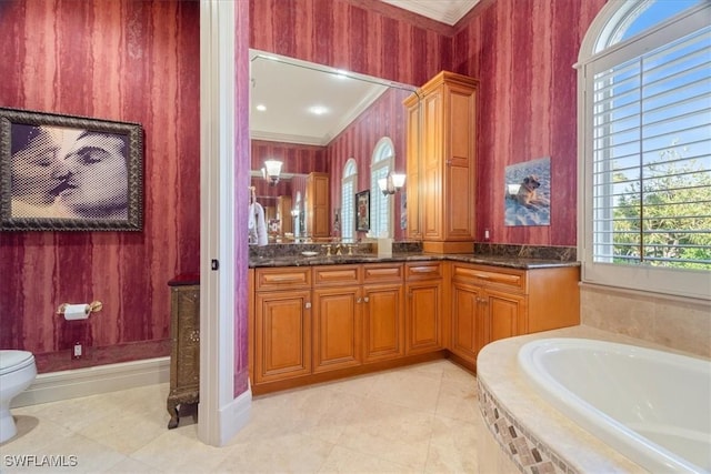 550 21st Ave S, Naples, FL 34102 - full bath with crown molding, toilet, vanity, and a garden tub