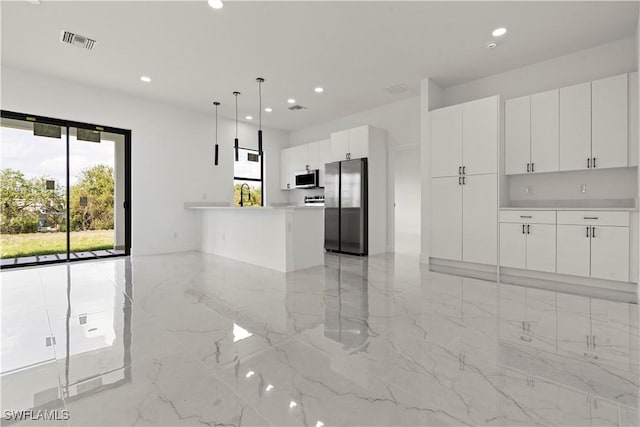 kitchen featuring visible vents, recessed lighting, appliances with stainless steel finishes, and a healthy amount of sunlight